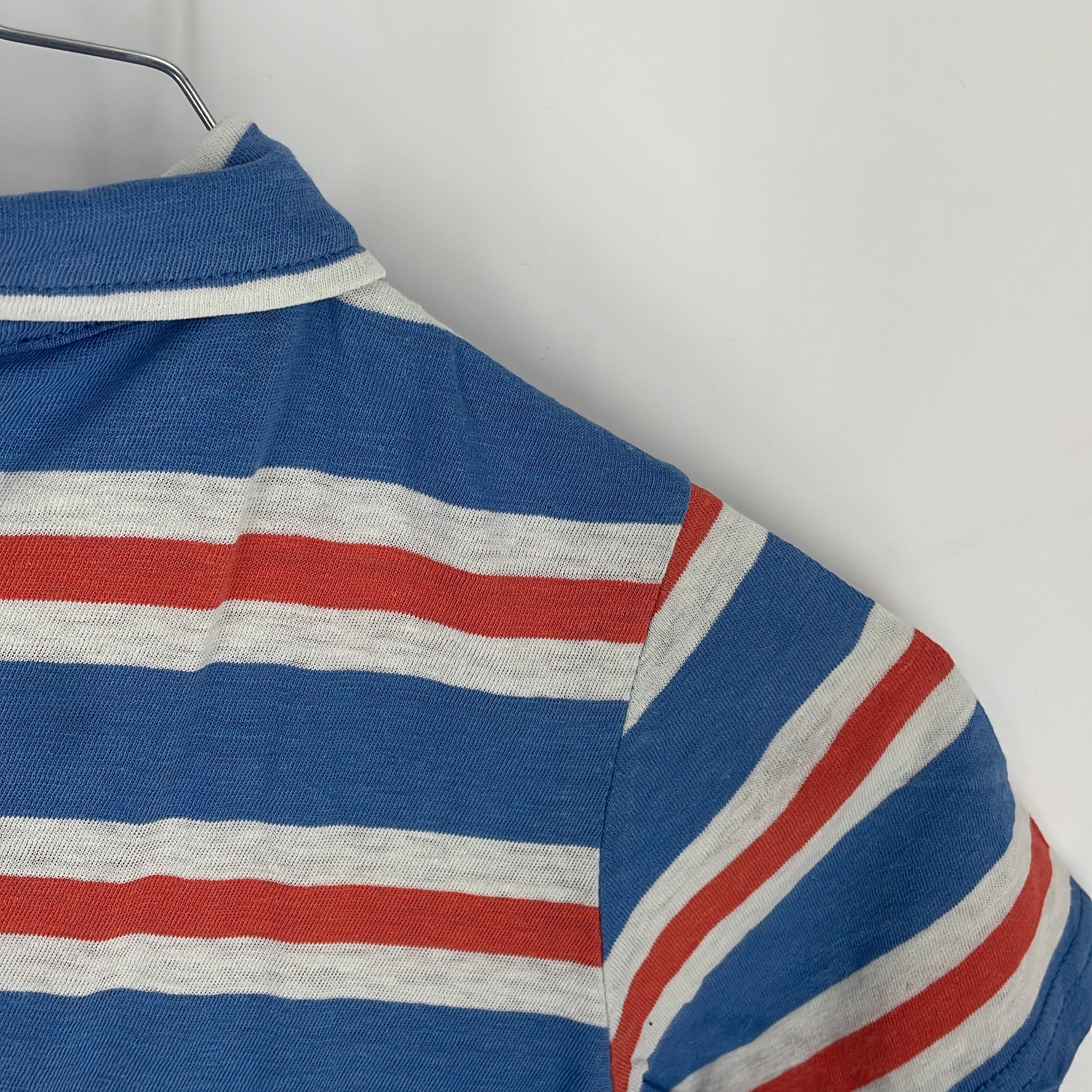 1-AO 76 - Polo rayé - Taille 6 ans