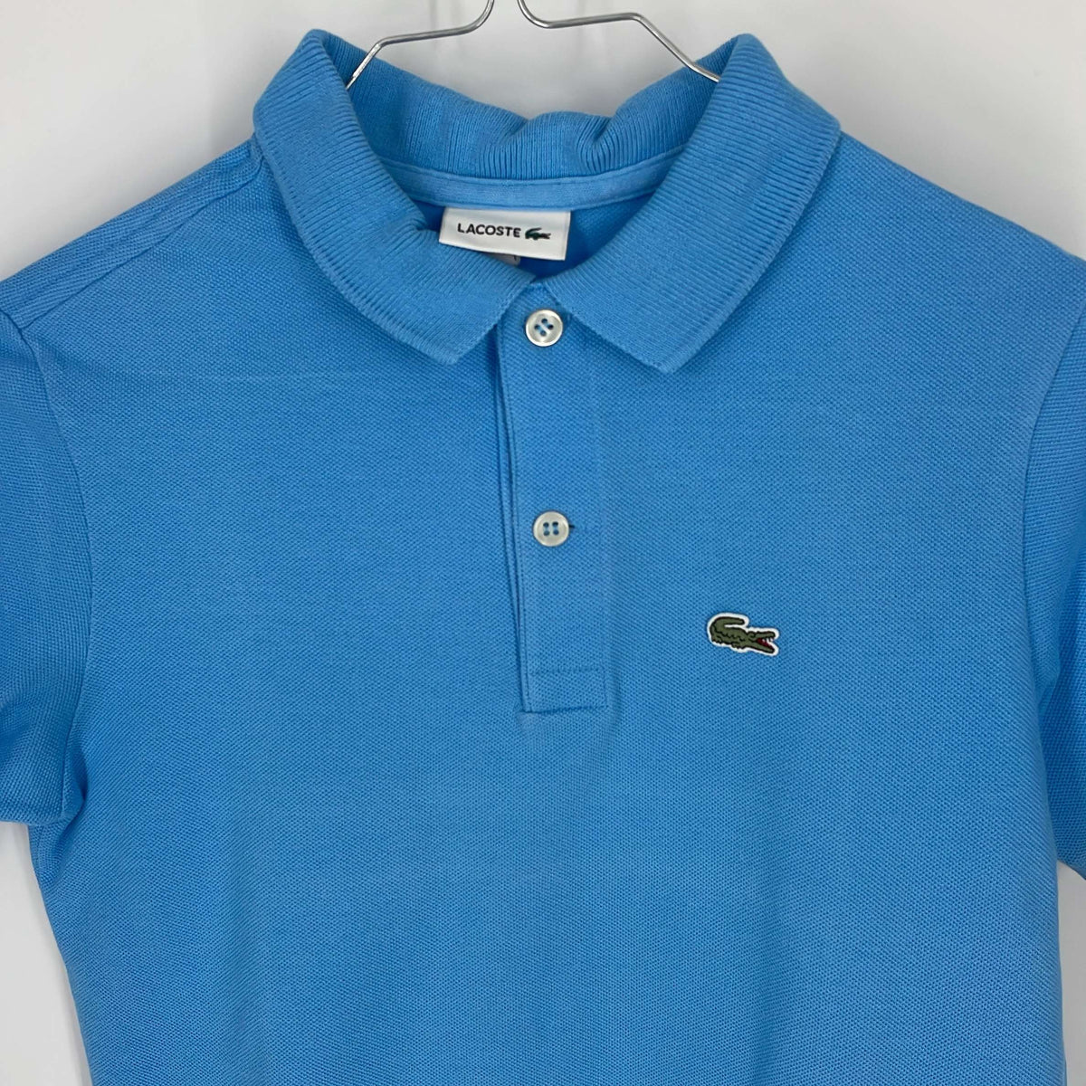 1-T-shirt manches courtes Lacoste 12 ans