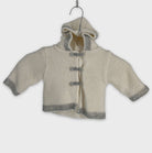 0-Gilet Marque Inconnue 6 mois
