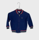 0-Veste/manteau Lacoste 4 ans